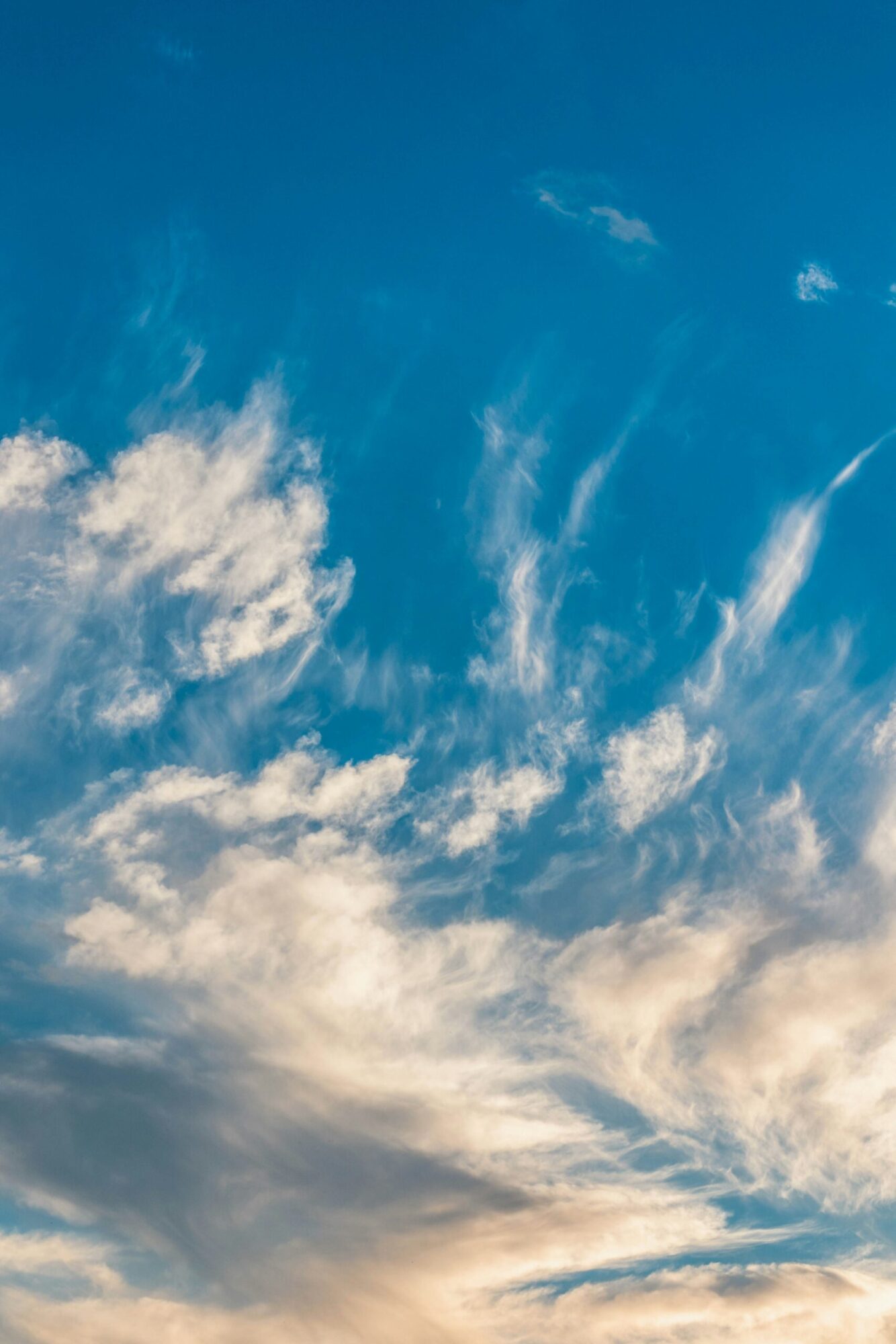 Open sky and clouds representing fresh air and improved indoor ventilation
